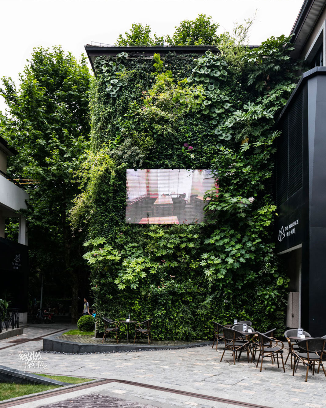 Mingzhu Nerval vertical living wall experts created a sustainable city architecture for the Mixed Place in Shanghai, 2016